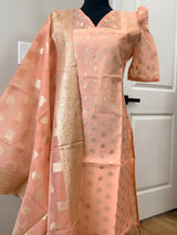 Kanakambaram color kurti set paired with gold leggings