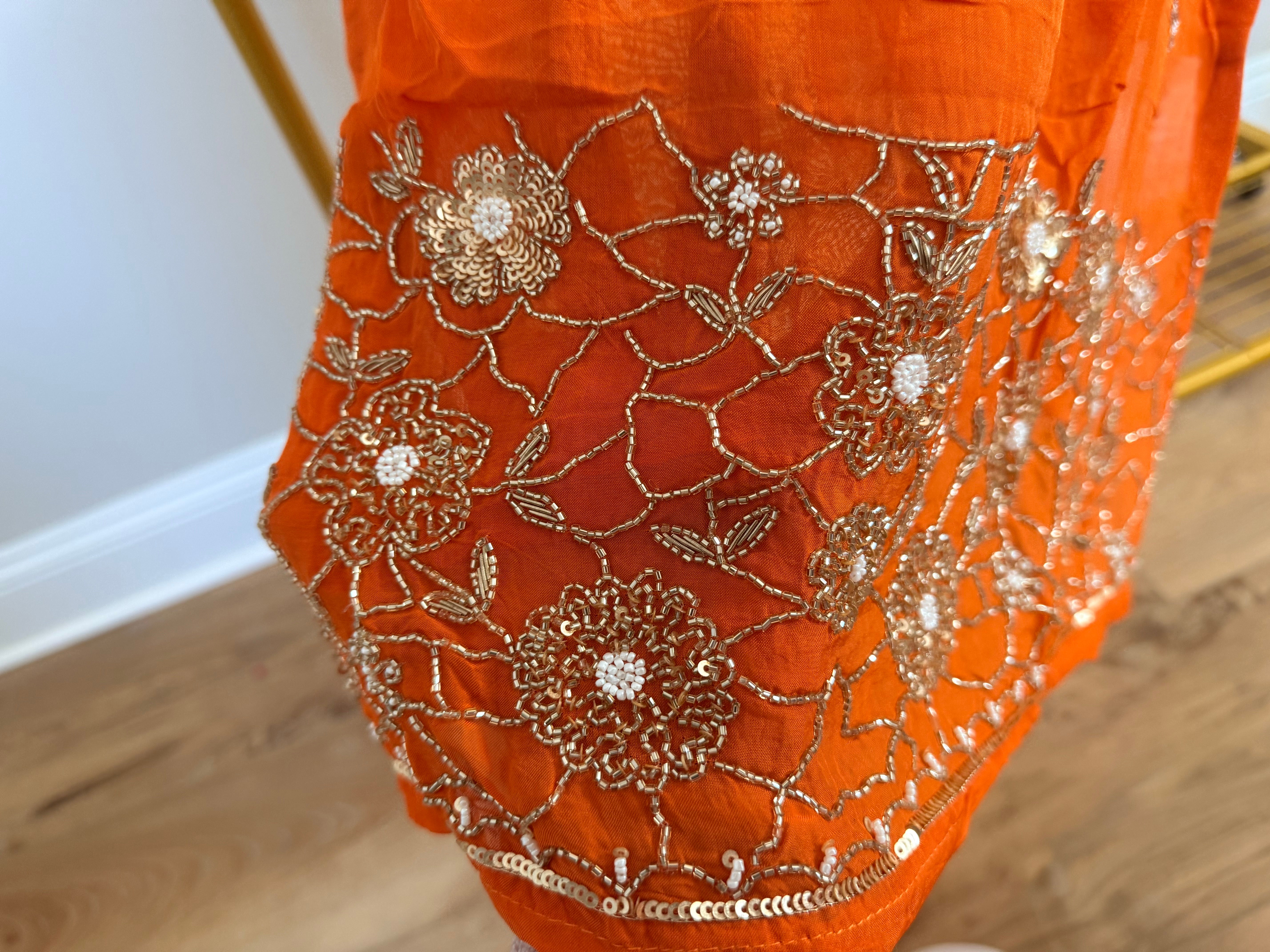 Orange organza set with hand work