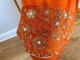 Orange organza set with hand work