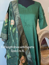Green sequins silk dress paired with printed floral dupatta