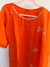 Orange organza set with hand work