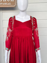 Red chinnon dress with hand work on hands