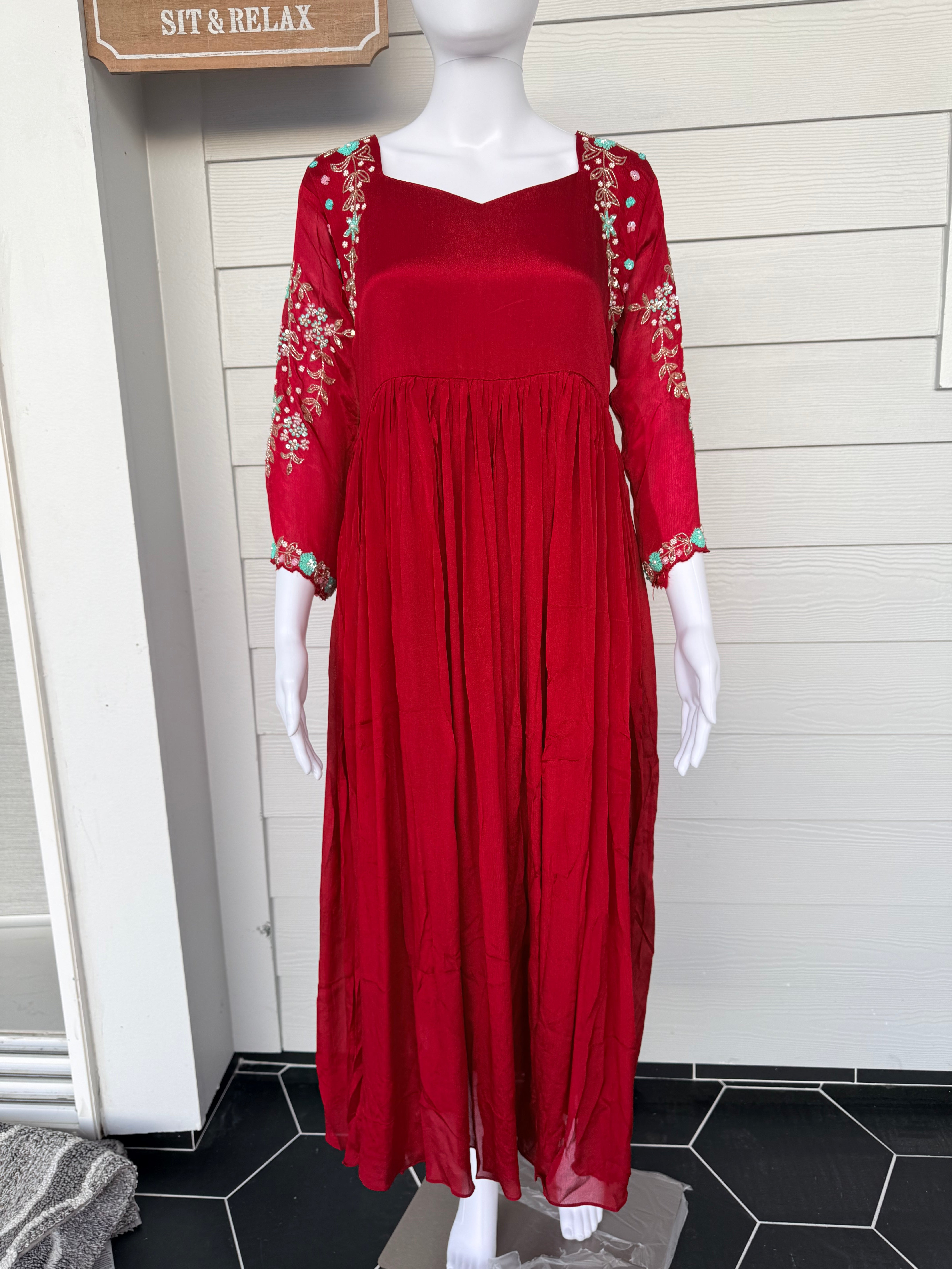 Red chinnon dress with hand work on hands