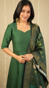 Green sequins silk dress paired with printed floral dupatta
