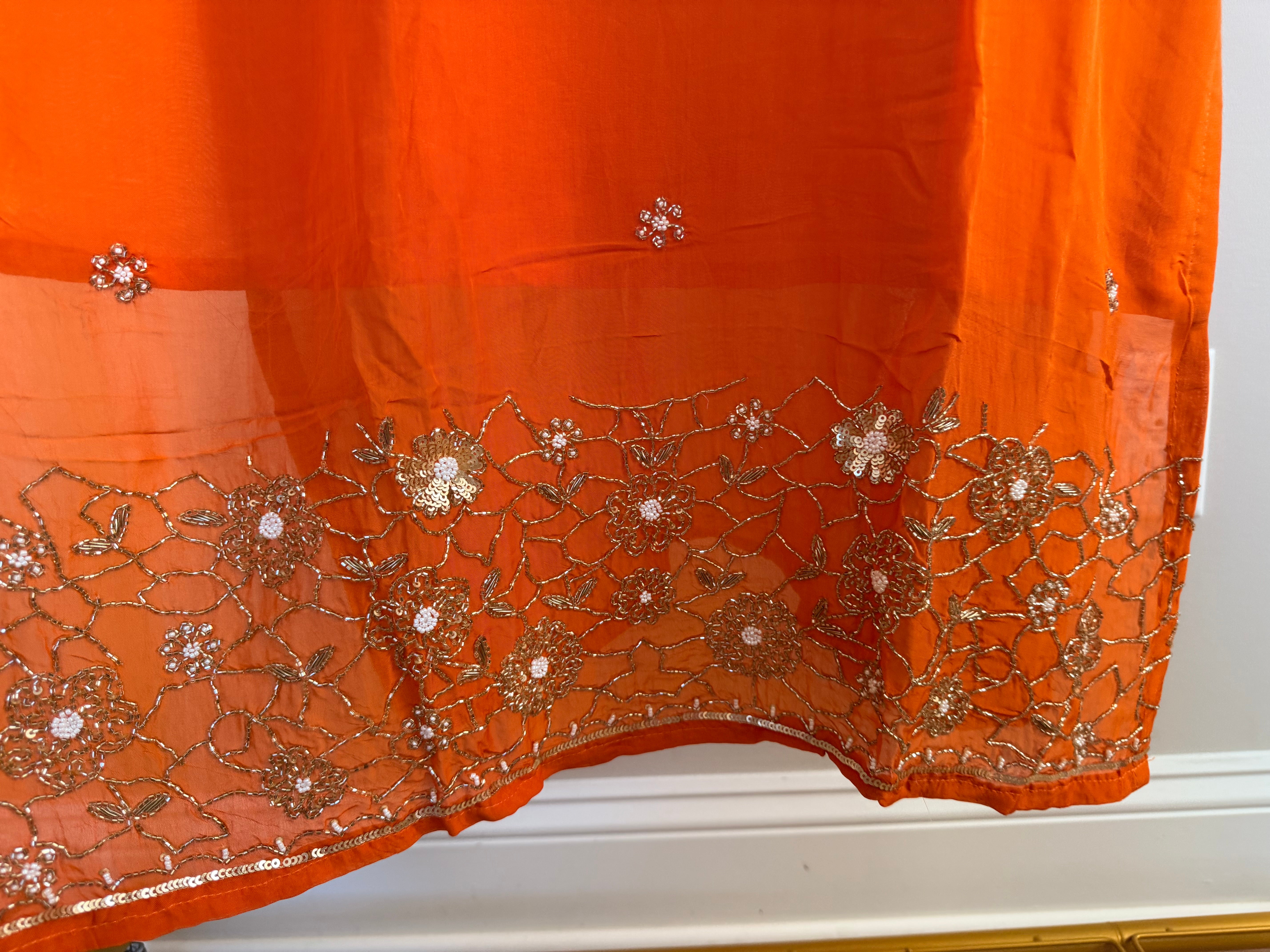 Orange organza set with hand work