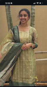 Chanderi pista green color kurti set paired with gold leggings