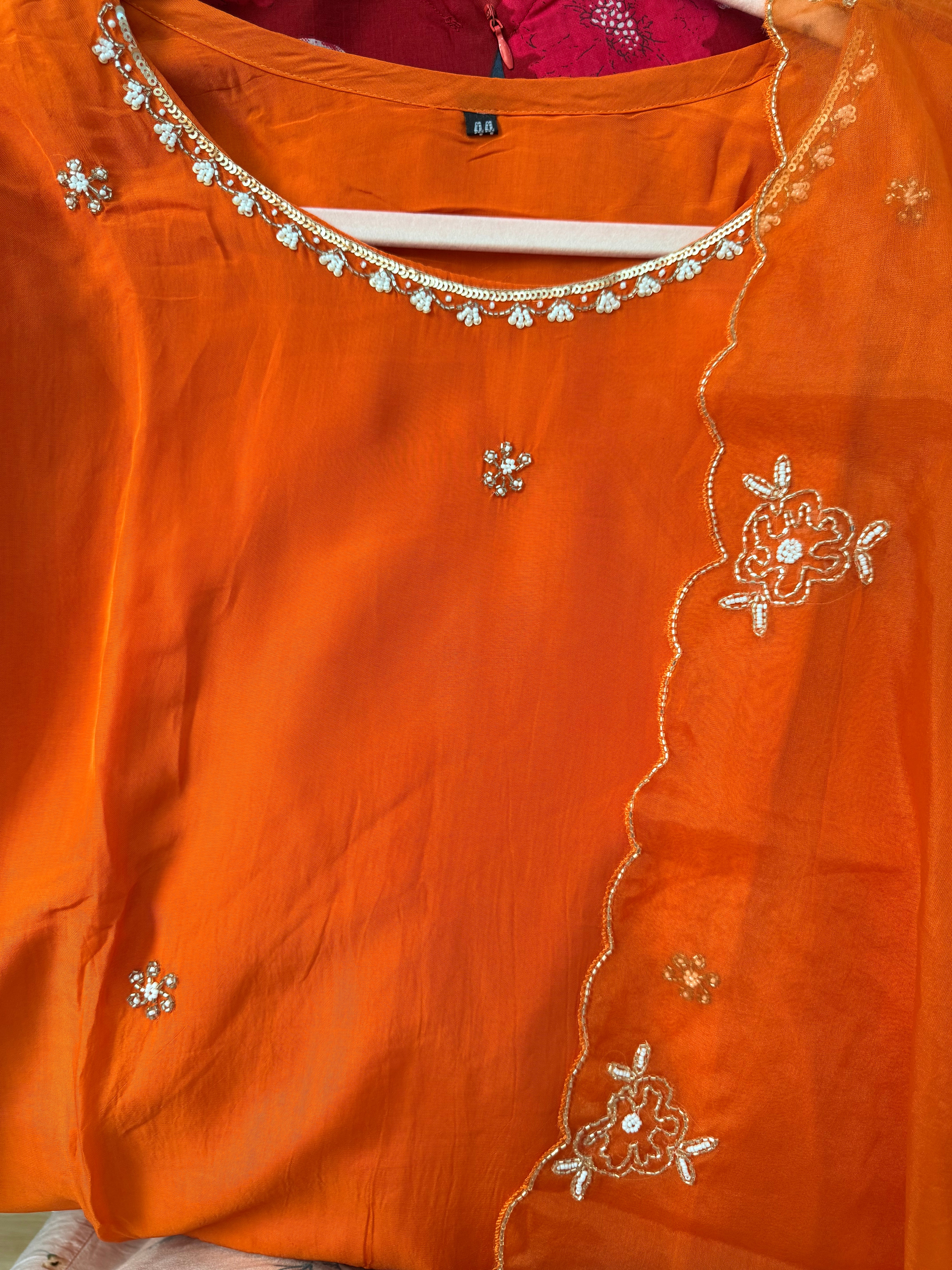 Orange organza set with hand work