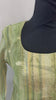 Chanderi pista green color kurti set paired with gold leggings